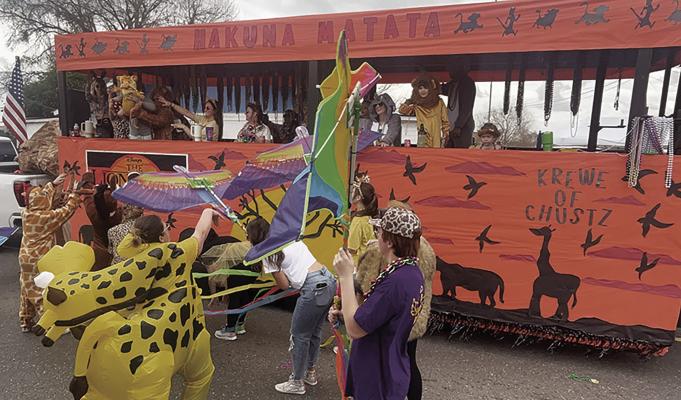 Photo by John Dupont ‘The Lion King,’ sponsored by the Krewe of Chustz, won first place in the float competition at the Livonia Mardi Gras Parade.