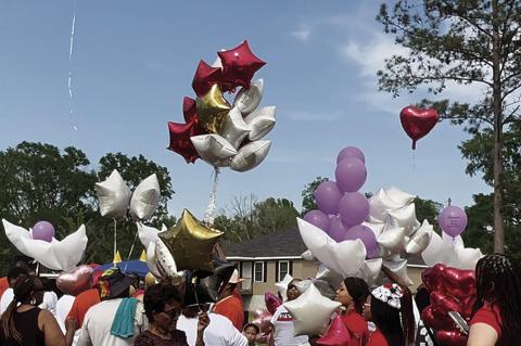 A balloon launch in memory of deceased residents was among the festivities at the Second Annual Pleasant View Subdivision Reunion on April 6 in New Roads. Photo by John Dupont