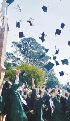 Caps in air, we’re graduates