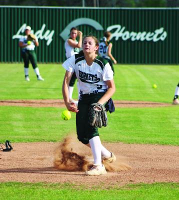 Morgan Landry of Catholic High of Pointe Coupee warms up in a recent game. Landry pitched a 3-hit shutout of New Iberia on Wednesday as the Hornets go the the Division IV Select playoffs as the No. 1 seed.